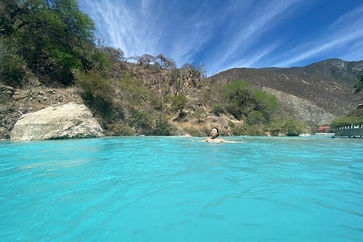 Turquoise river swimming